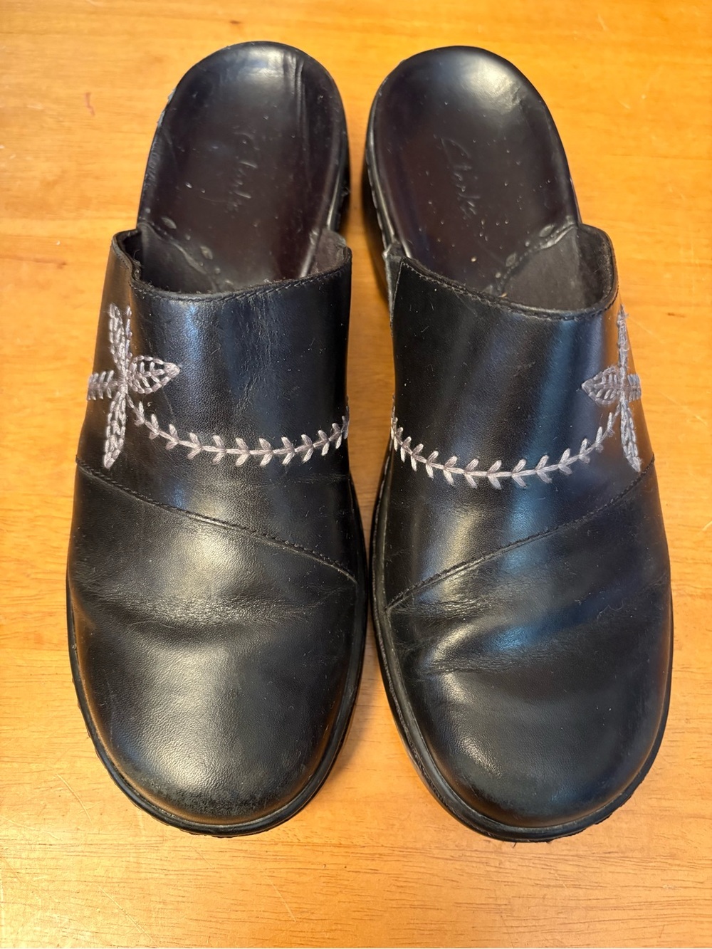 Clarks Black Leather Slip-On Mules with Contrast Stitching